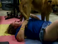 Horny older wife does a blow job to her pet dog